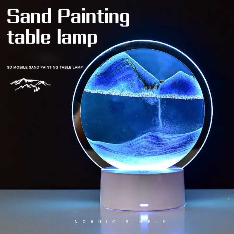 Dekorativ bordslampa med fascinerande 3D sandkonst, perfekt som inredningsdetalj och nattlampa.