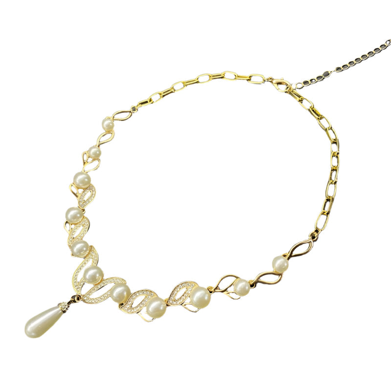 Elegant brudsmyckesset i guldpläterat med glittrande strass & pärlor, perfekt för bröllop och fest.