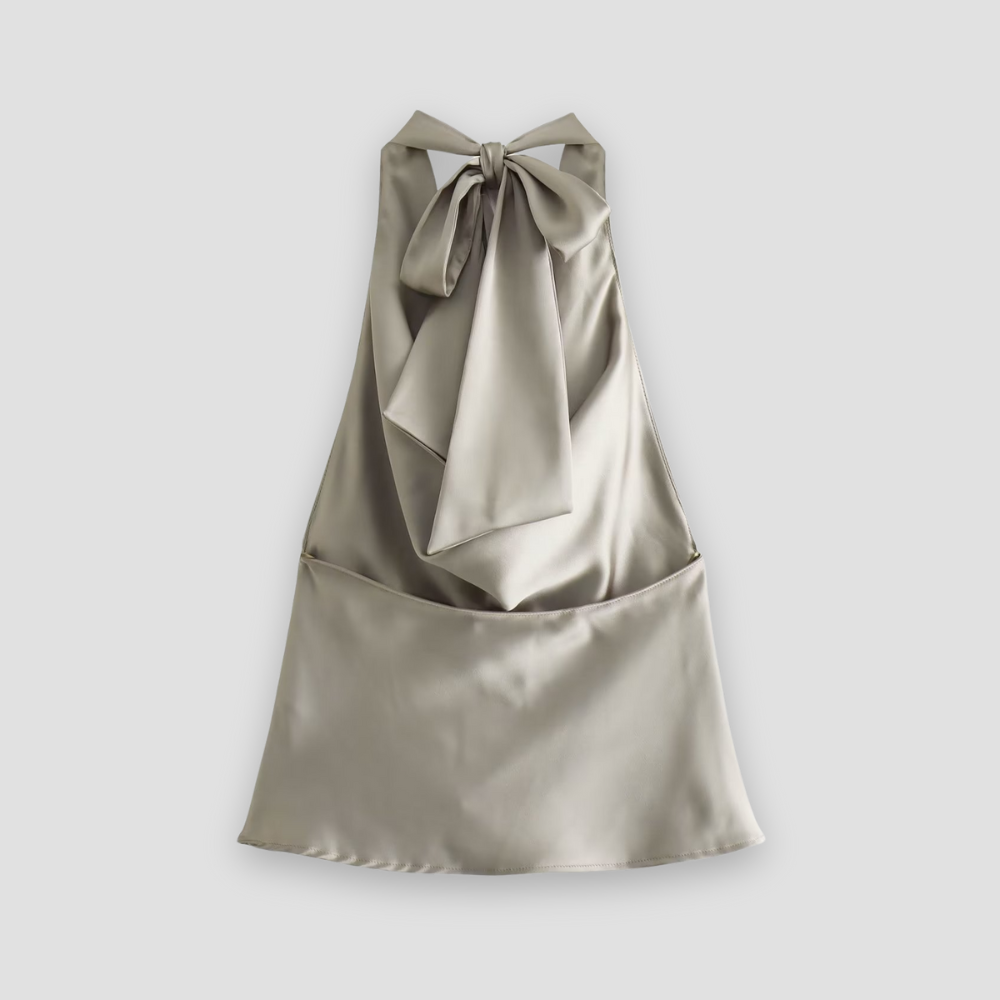 Mångsidig svart halternecktopp med draperad front, ett måste i kvinnors kvällsgarderob
