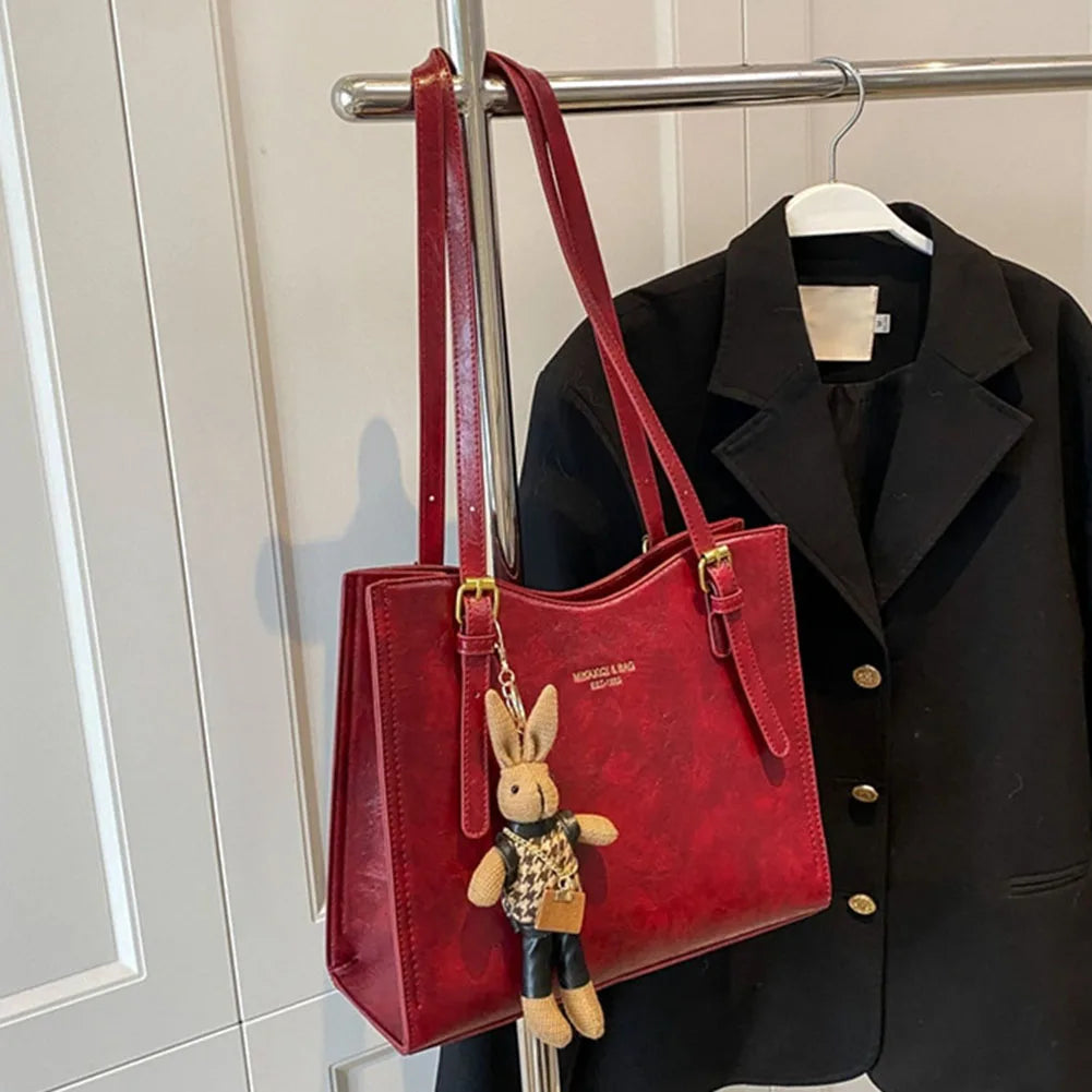 Svart elegant dam toteväska. Rymlig och charmig handväska för mode och en stilfull vardag.