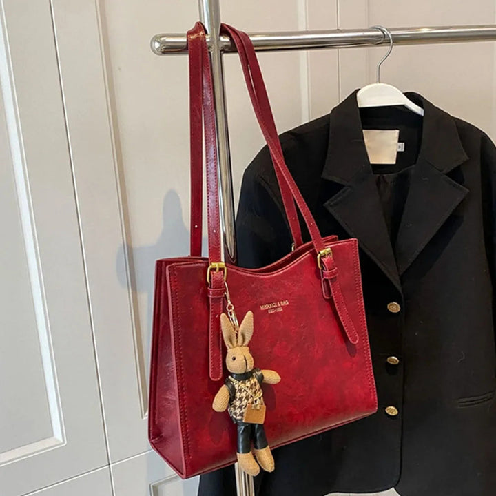 Svart elegant dam toteväska. Rymlig och charmig handväska för mode och en stilfull vardag.