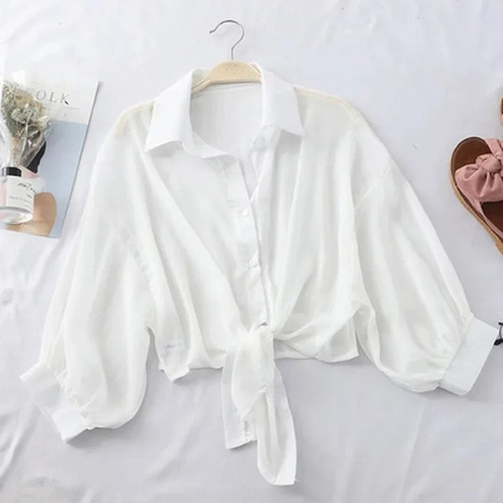 Casual elegant damblus: chiffongskjorta med knuten midja, somrig och bekväm.