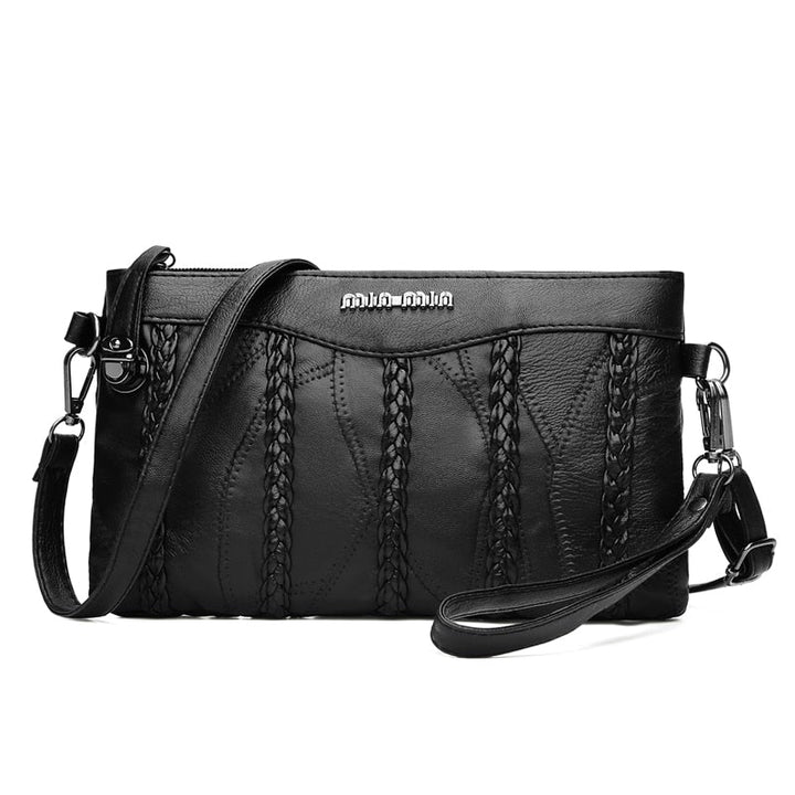 Mångsidig crossbody clutch för kvinnor. Perfekt som elegant festväska eller praktisk vardagsväska.