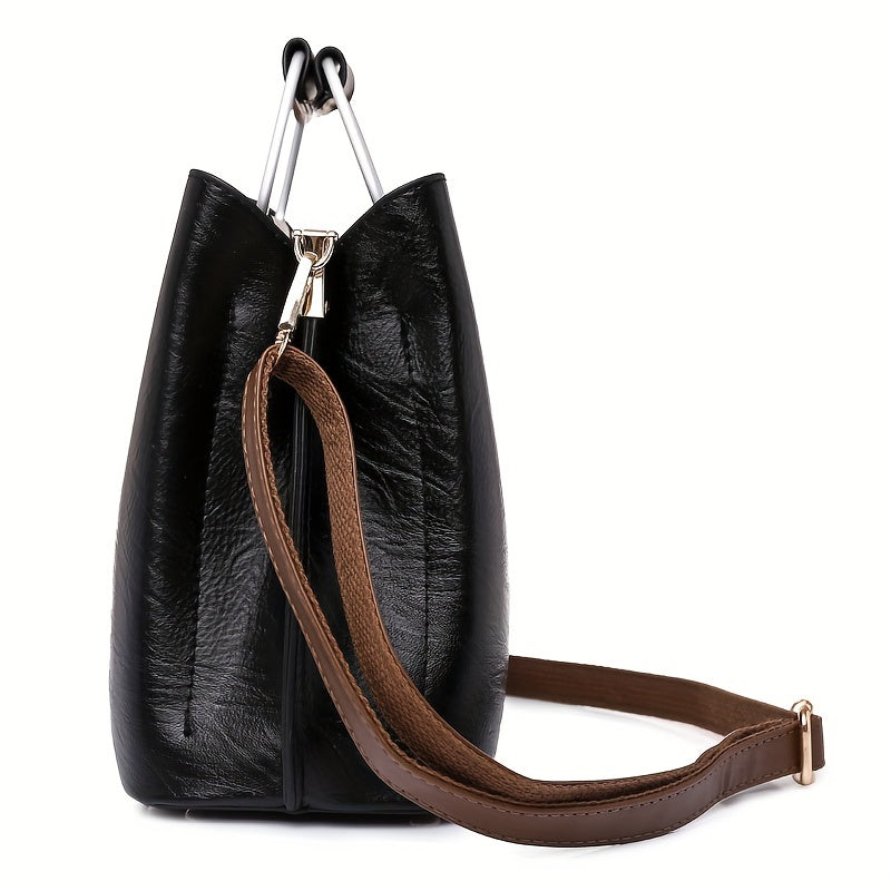 Snygg crossbody-väska för kvinnor med justerbar axelrem. Elegant design som passar som vardagsaccessoar.