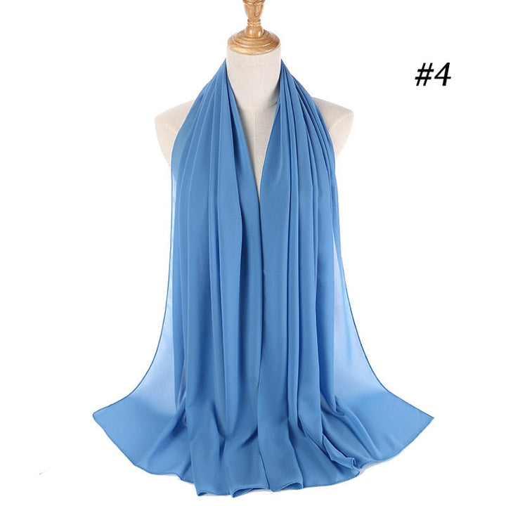 Dam chiffong hijab pannband i enfärgad design, lätt att styla för dagligt bruk.