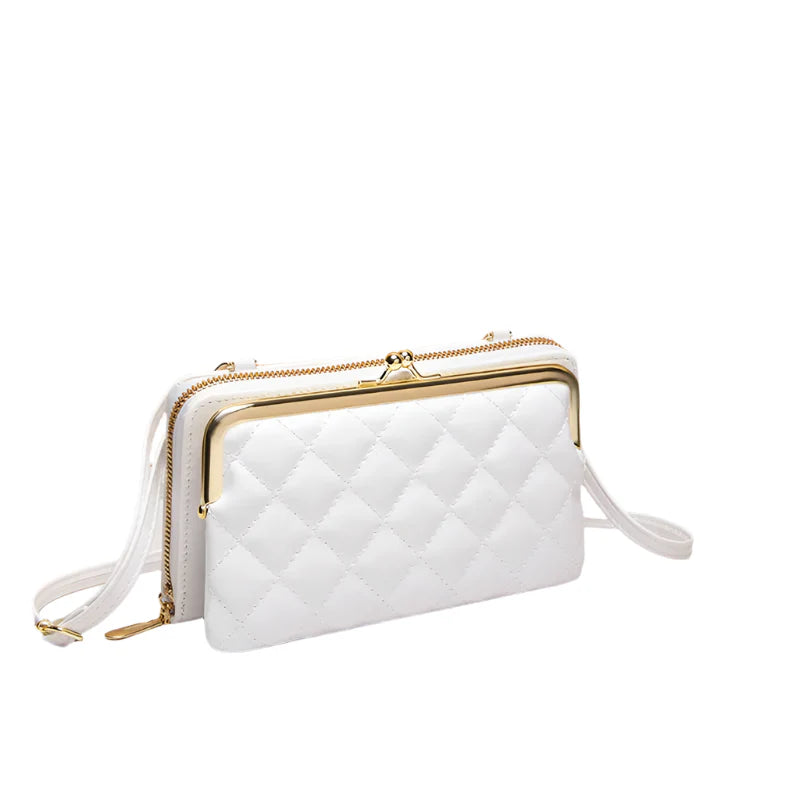 Elegant dam crossbody väska, svart och stilren. Perfekt axelremsväska för både vardag och fest.