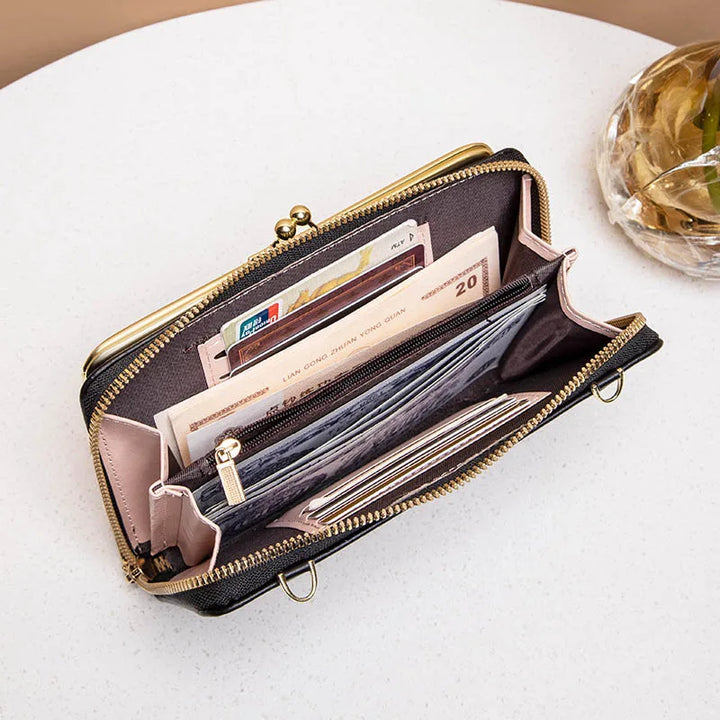 Modern dam crossbody väska med säkert fack. Elegant design, perfekt för att bära med stil och trygghet.