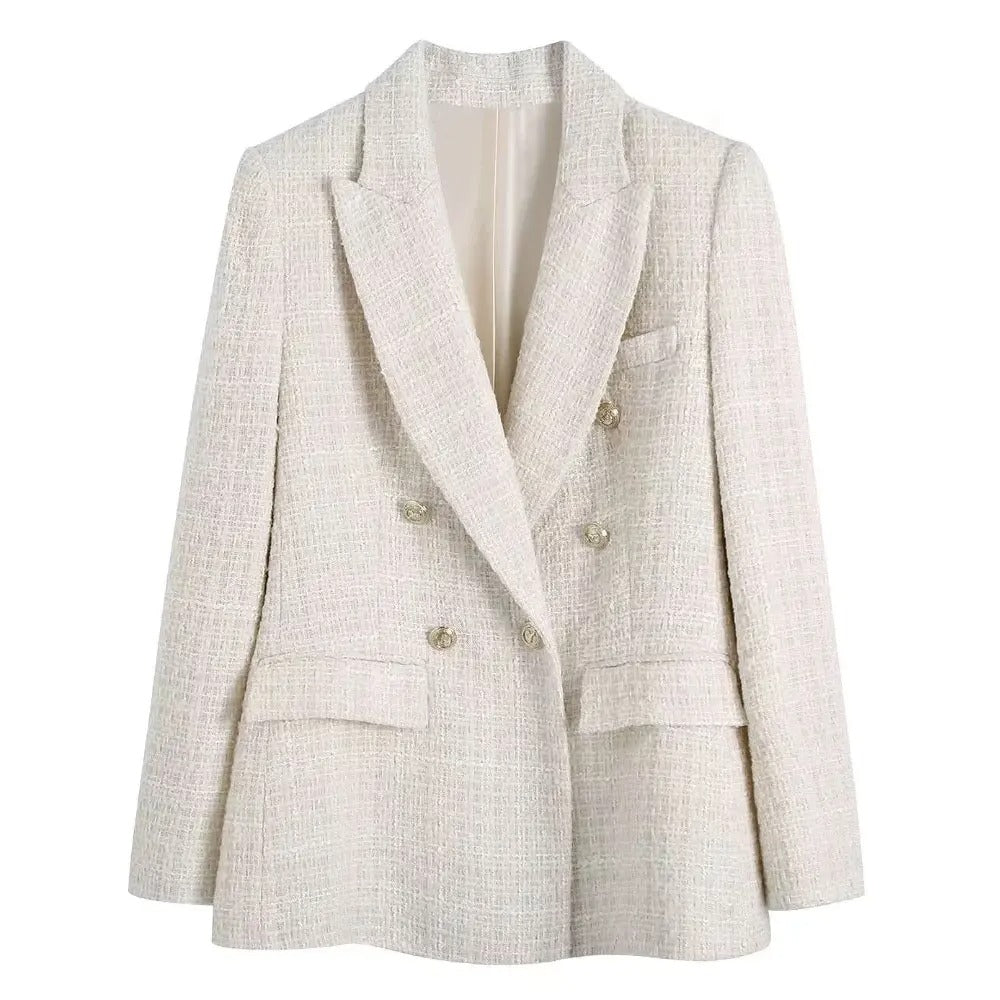 Elegant dam dubbelknäppt blazer i klassisk design, perfekt för kontoret eller som vardagsblazer.