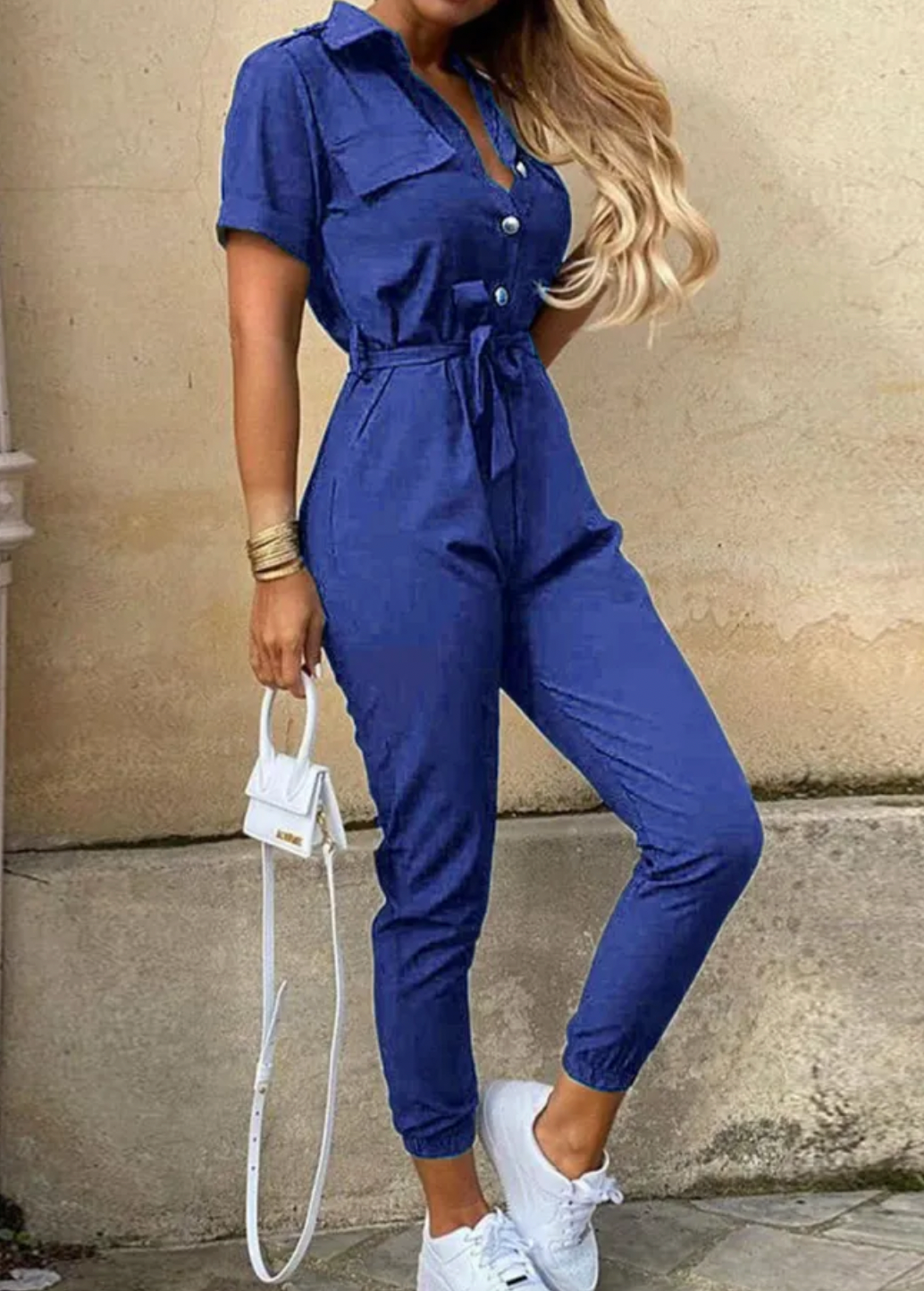 Mångsidig stilren dam jumpsuit, för fest, bröllop eller cocktailparty.