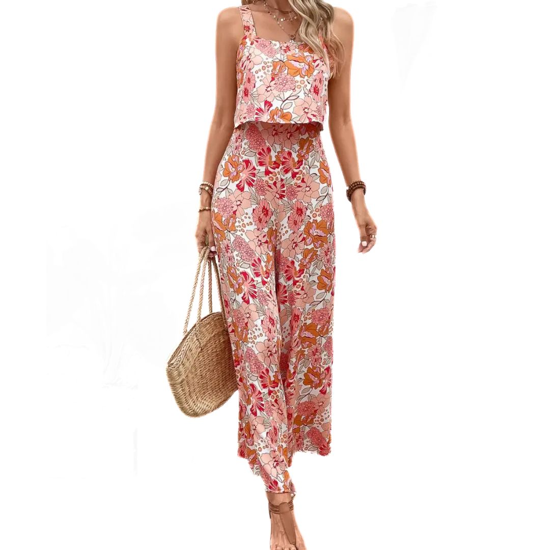 Elegant dam jumpsuit med blommigt mönster, ärmlös vintage stil och fyrkantig halsringning, perfekt för sommar.
