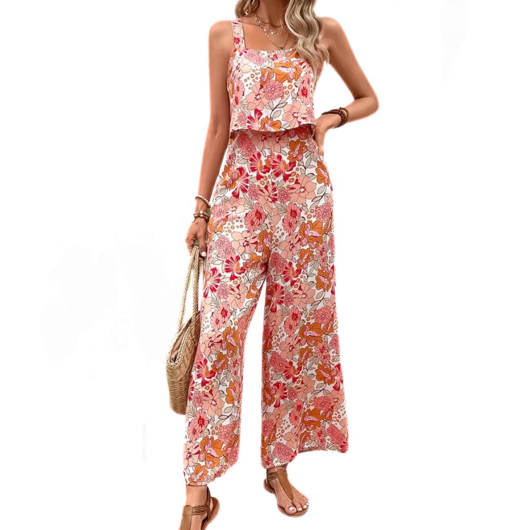 Bekväm dam jumpsuit med blommigt mönster, ärmlös och med fyrkantig halsringning i vintage stil.