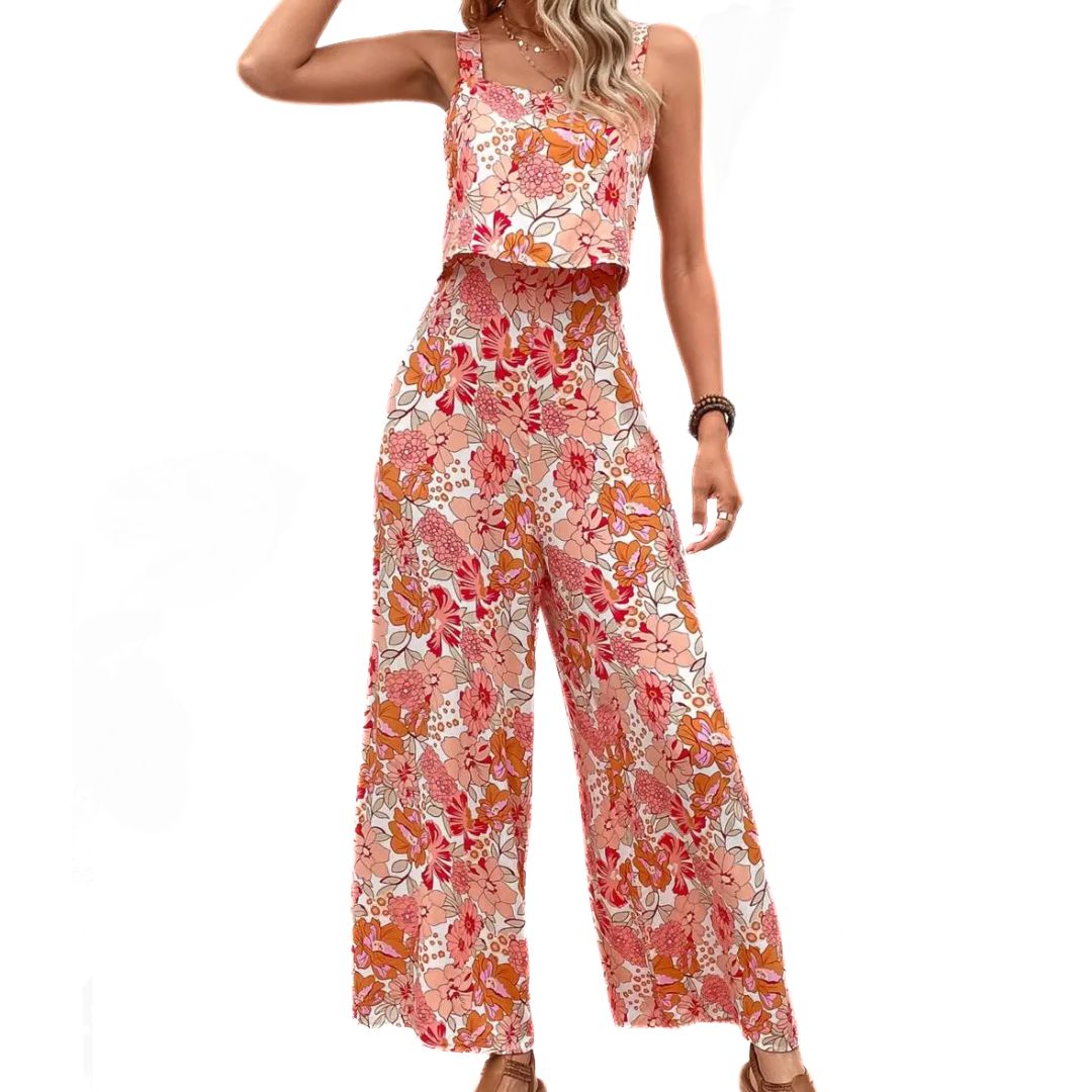 Elegant blommig dam jumpsuit i vintage stil, ärmlös design med vackert mönster, perfekt för sommarfester.