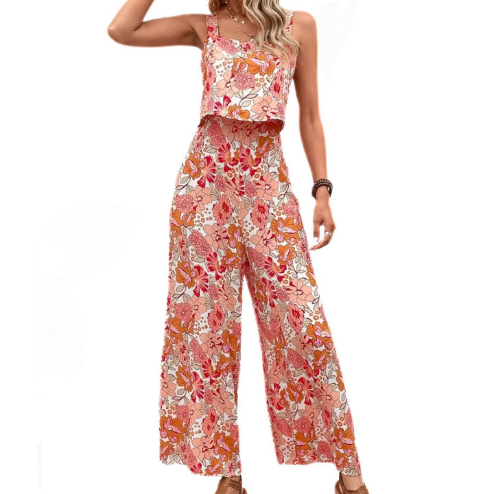 Elegant blommig dam jumpsuit i vintage stil, ärmlös design med vackert mönster, perfekt för sommarfester.