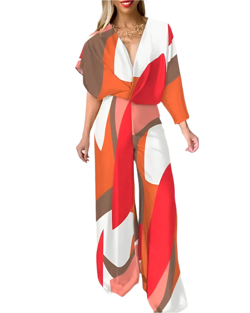 Elegant dam jumpsuit med smickrande V-hals och bekväm vingärm, perfekt för sommarfester och event.