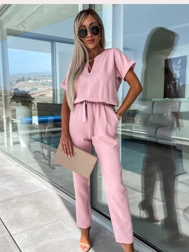 Stilren kaki dam jumpsuit, V-hals & elastisk midja. Mångsidig för festkläder eller vardag.