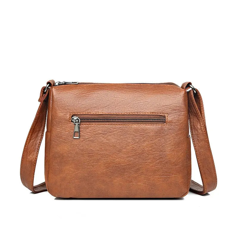 Svart stilren damväska, messenger. Perfekt som vardags- eller axelväska. Elegant och rymlig.