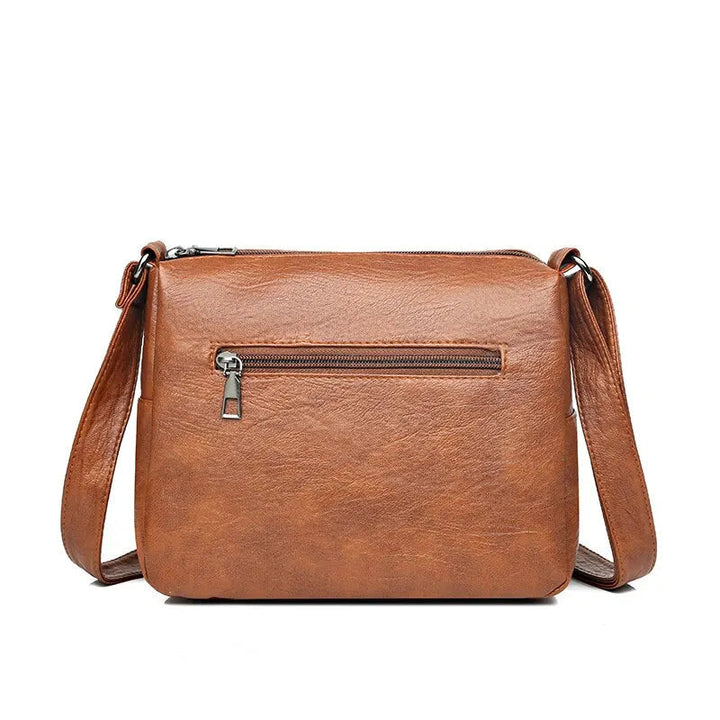 Svart stilren damväska, messenger. Perfekt som vardags- eller axelväska. Elegant och rymlig.