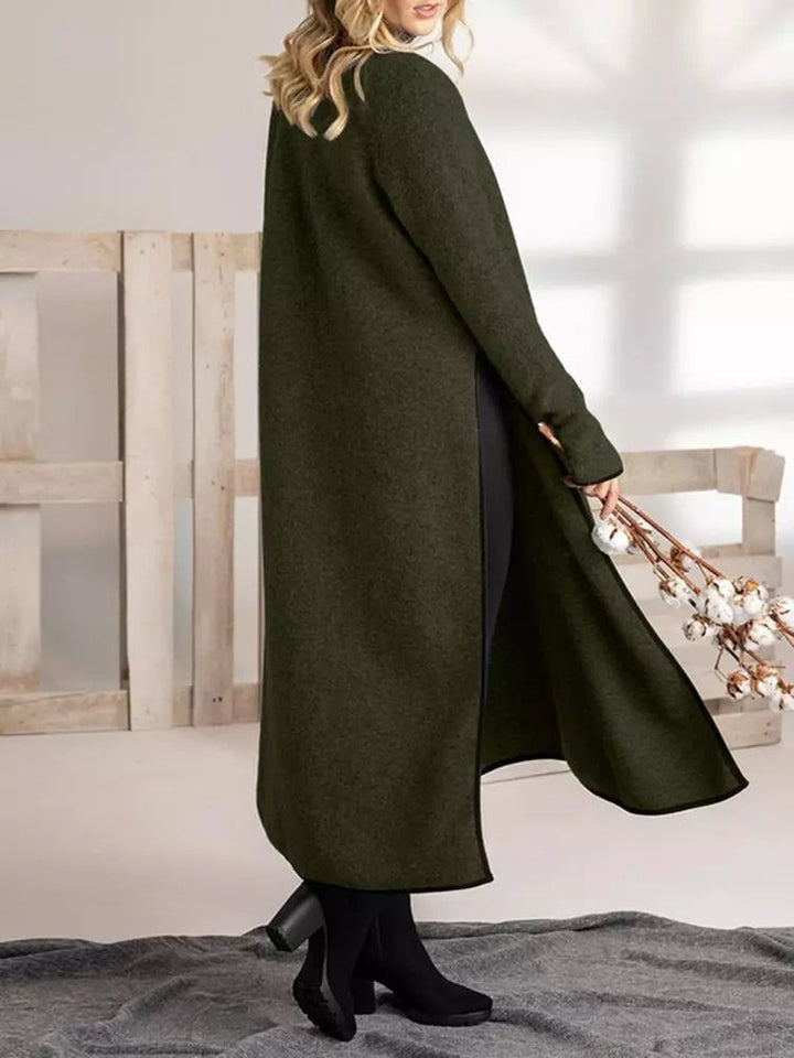 Stilfull sommar- och festklänning för damer, en elegant midiklänning med modern delad design.