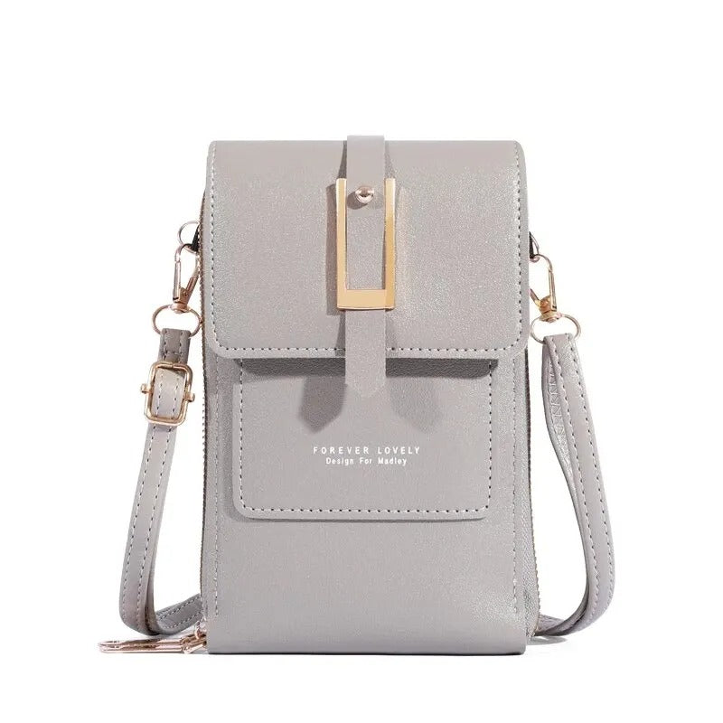Snygg mobilväska för dam i beige konstläder, crossbody modell med inbyggd korthållare.