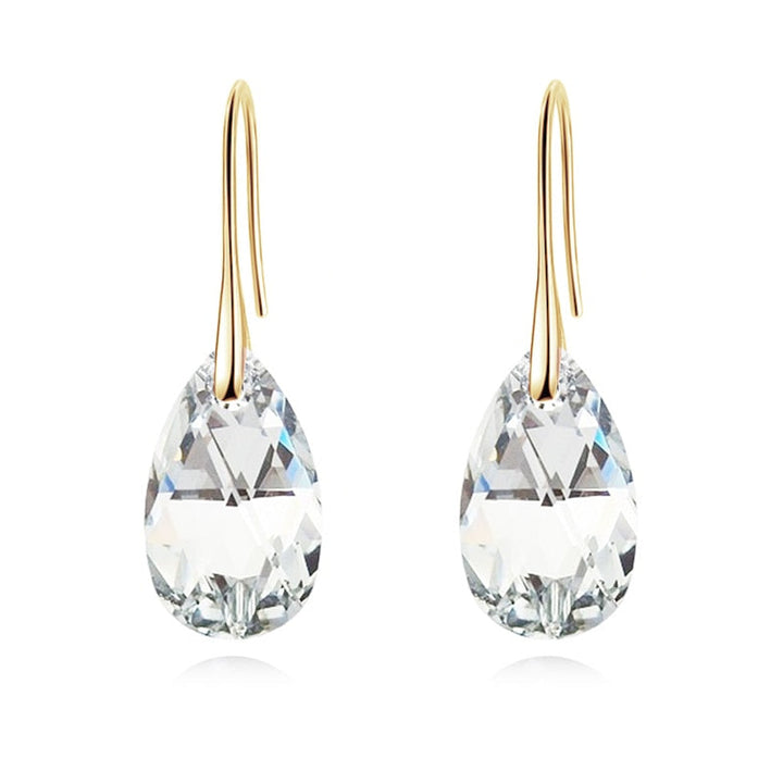 Damörhängen med droppformade kristaller i en vacker lila färg, ett glamoröst val. Droppformad accessoar.