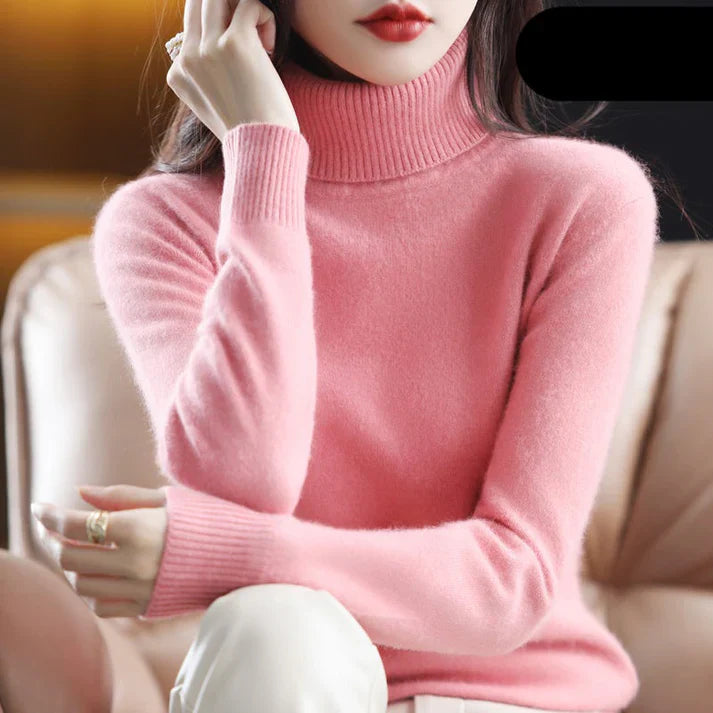 Modern dam rollkragenpullover i mjukt material. En bekväm och stilren tröja för damkläder i modekategori.