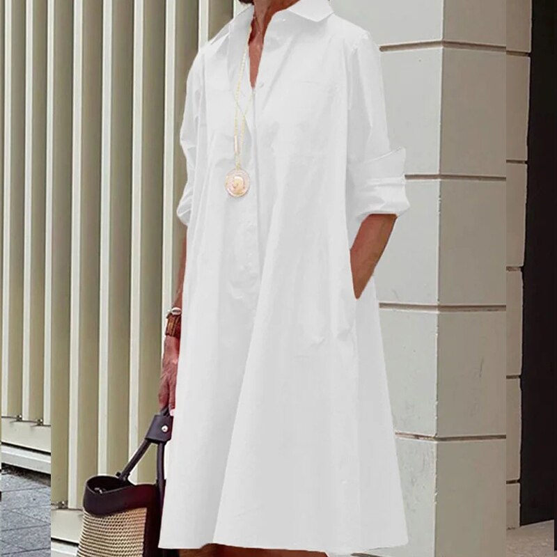 Bekväm och avslappnad sommarklänning för dam. Lättviktig kortärmad design med lös passform, perfekt sommarstil.