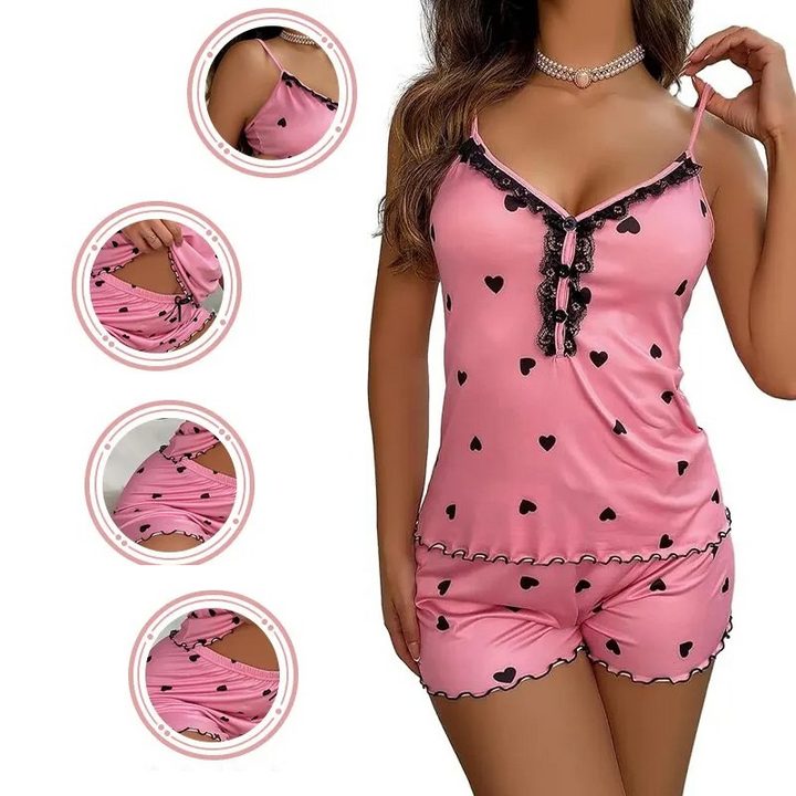 Hemmakläder: Elegant dam pyjamas set med djup V-ringning och shorts. Bekväm sommarstil i rosa/grått.