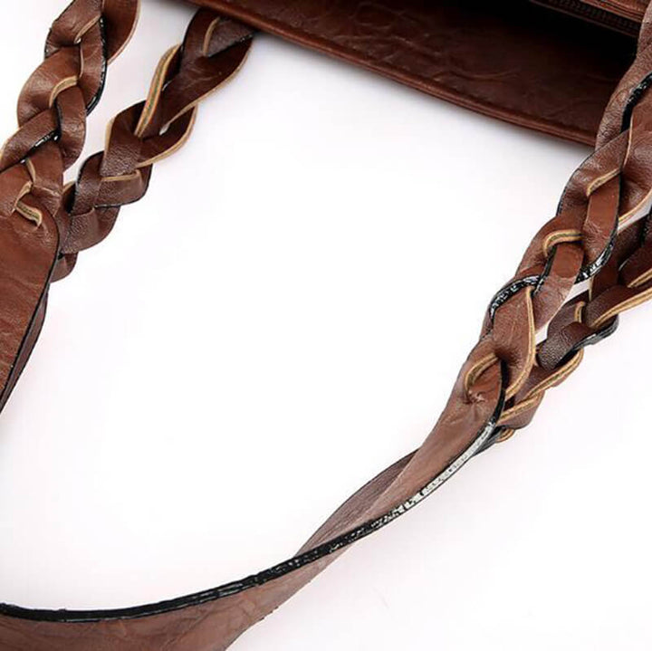 (Product) elegant damaxelväska i modern läderimitation, perfekt för vardagsbruk, brun färg.