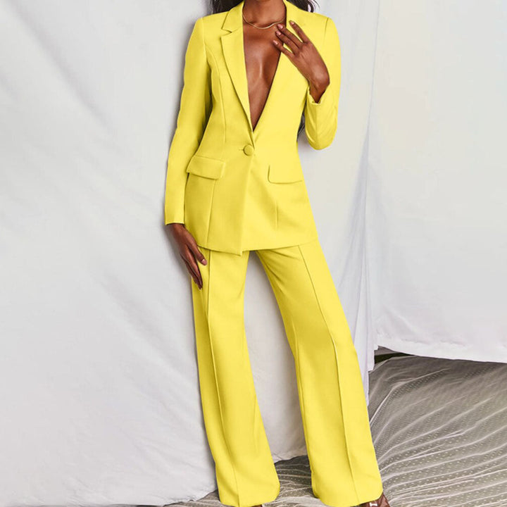 Elegant damblazer och byxset i svart polyester, perfekt för formella tillfällen och kontoret.