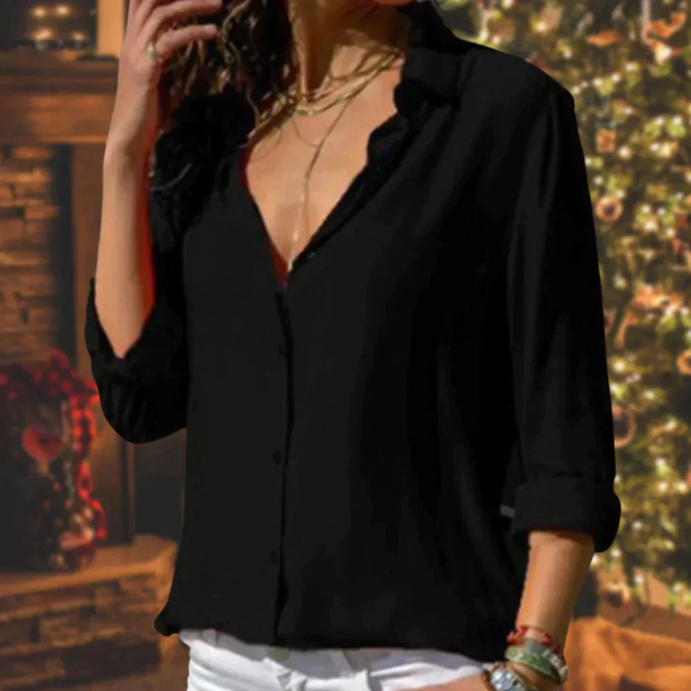 Damblus på modell, visar elegant fall och modern design. Färgglad festblus som passar både vardag och fest.