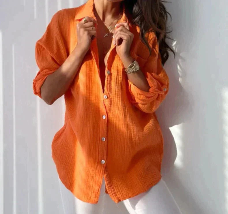 Elegant damblus i lättviktigt tyg, perfekt för sommar och vår, andningsbar och mångsidig.