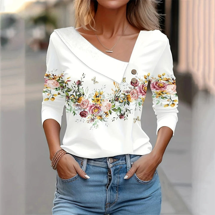 Vardagsblus för kvinnor i polyester med blommönster och långa ärmar för en bekväm och chic stil.