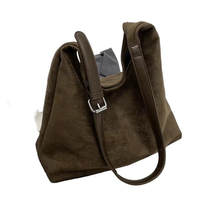 Stilren axelväska/crossbody i trunkstil, rymlig för dina nödvändigheter, modern modeaccessoar.