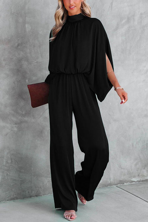 Stilren kvinnorsbyxdress för fest & sommar. Bekväm passform, vida ben och elegant stativkrage.
