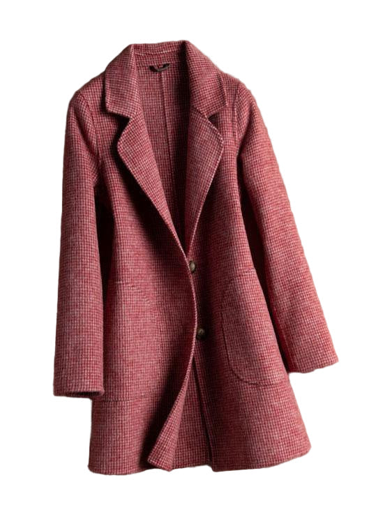 Elegant damkappa med praktiska fickor. Ett mångsidigt ytterplagg i modern stil för kvinnor.