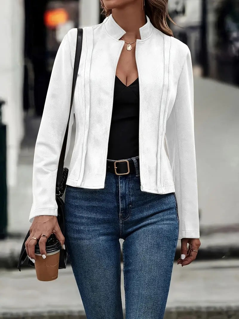 Stilren damkappa med öppen front och ståkrage. Mångsidig höstjacka för en modern och bekväm look.