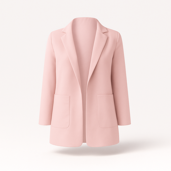 Kvinna i stilren damkavaj kombinerar businesslook med vardagsmode. Mångsidig höstkavaj.