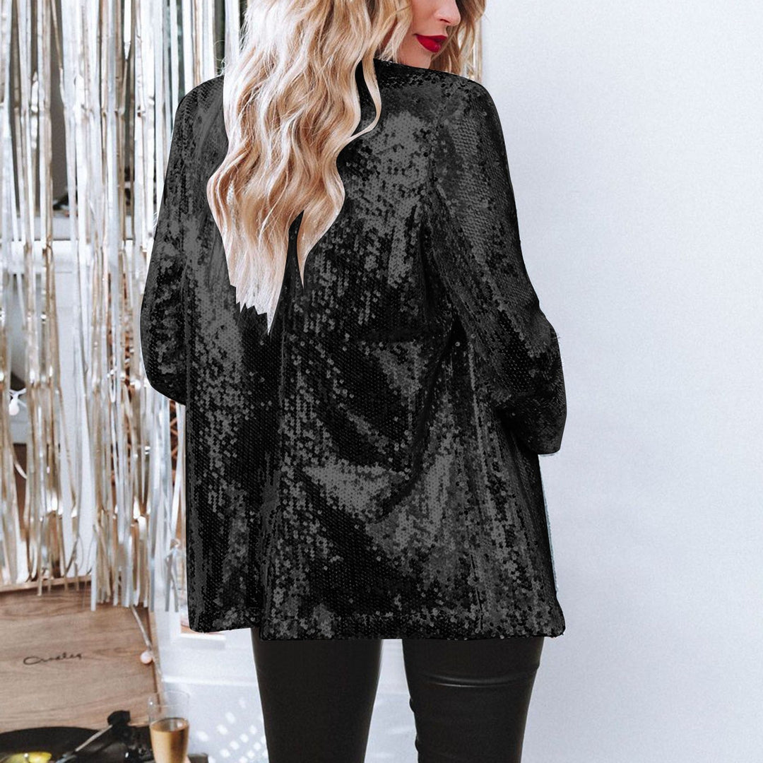 Svart paljettkavaj för dam, en glittrande festtopp som ger stil och elegans till din outfit.