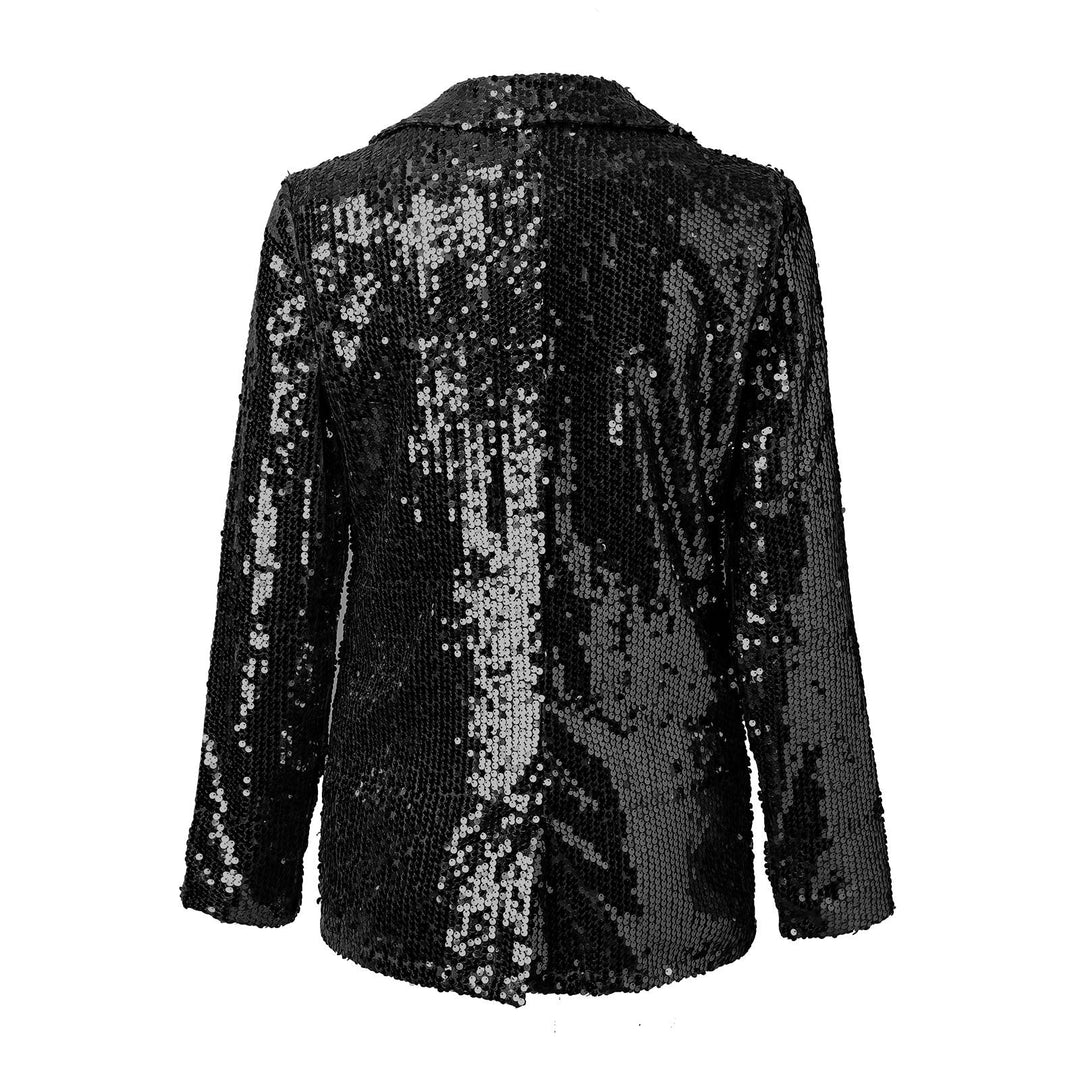 Guldglittrig damkavaj med paljetter. Denna eleganta modekavaj är perfekt för festliga tillfällen.