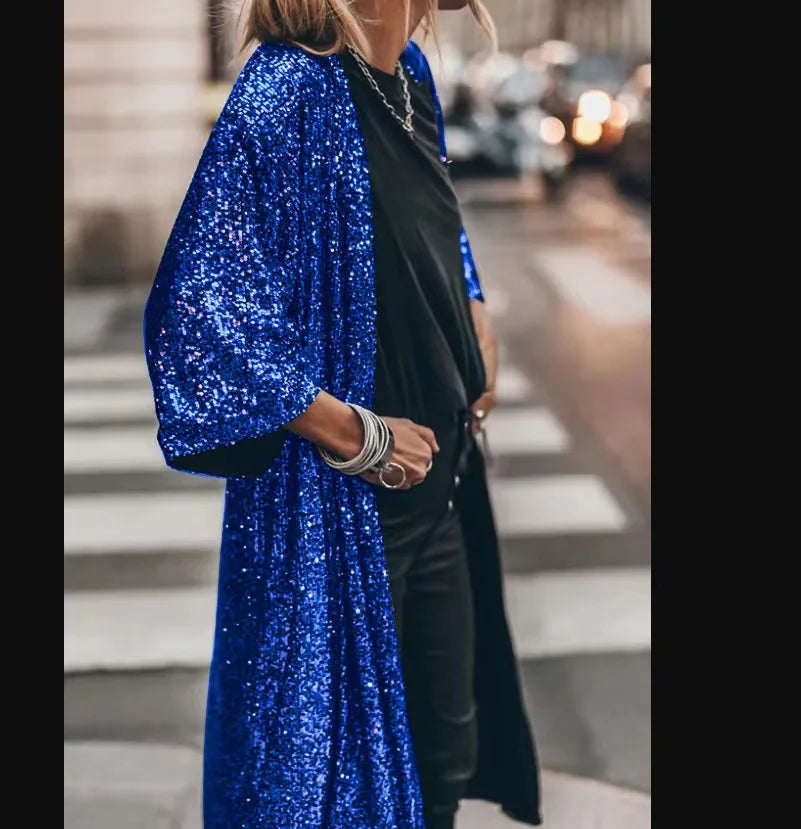 Snygg damkimono med paljettdetaljer och bekväm 3/4-ärm. Perfekt för vardagsbruk eller en elegant look.
