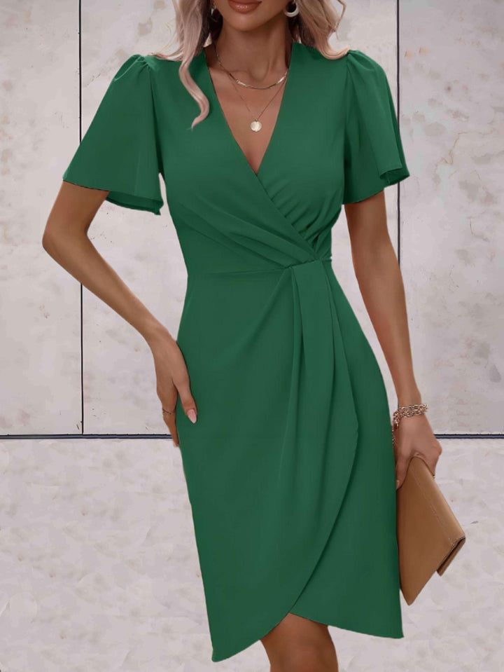 Vårkläder: Figurnära damklänning med utsvängda ärmar, bekväm stretch och elegant stil.
