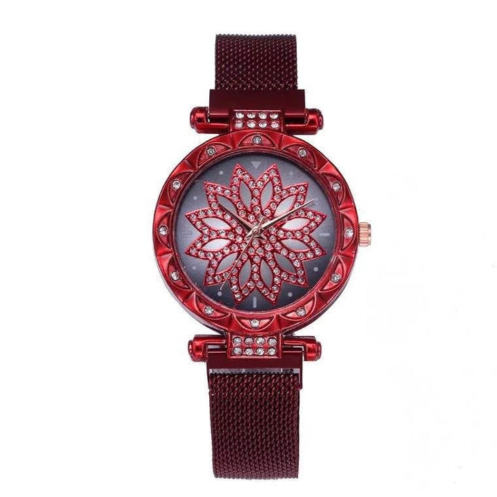 Svart kvartsdamklocka med minimalistisk design och flexibelt magnetiskt armband. För den stilmedvetna.