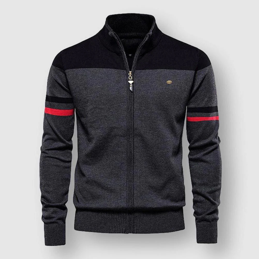 Unik damkofta med stativkrage och kontrasterande detaljer. Elegant cardigan med dragkedja, perfekt för moderna kvinnor.