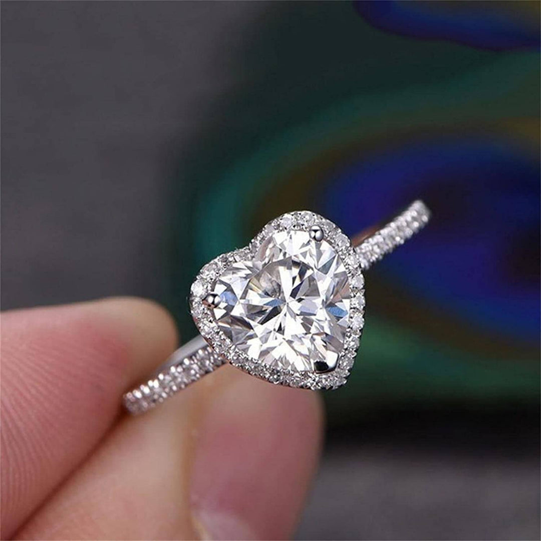 Förtrollande damring med hjärta cubic zirconia, sterlingsilver förlovningsring.