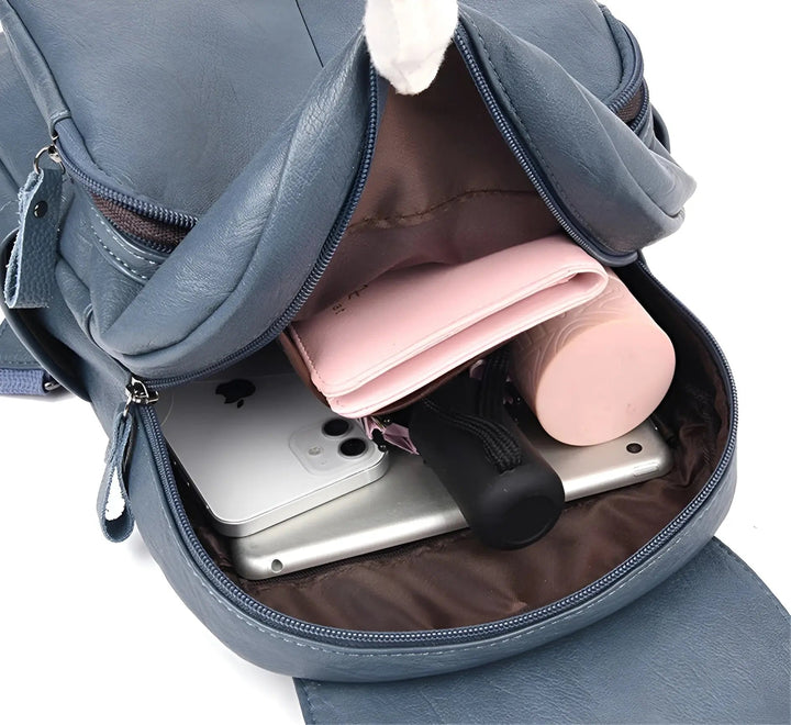 Ergonomisk damryggsäck med justerbara axelband & stöldskyddsfunktioner. Optimal komfort & säkerhet.