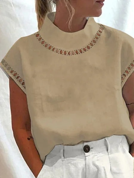 Stilren kvinnomode top, perfekt som kontorskläder eller elegant festtopp. Bekväm och modern.