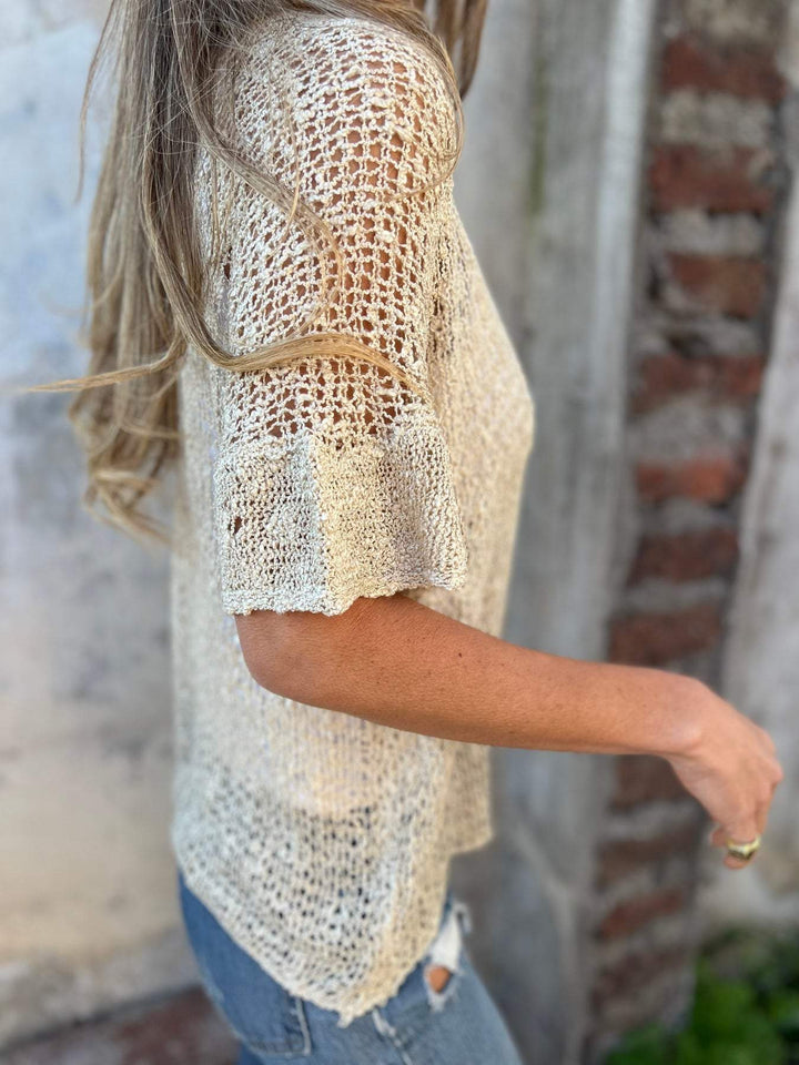 Bekväm kvinnors texturerad topp med v-hals, mjuk stickning för en elegant och avslappnad look.