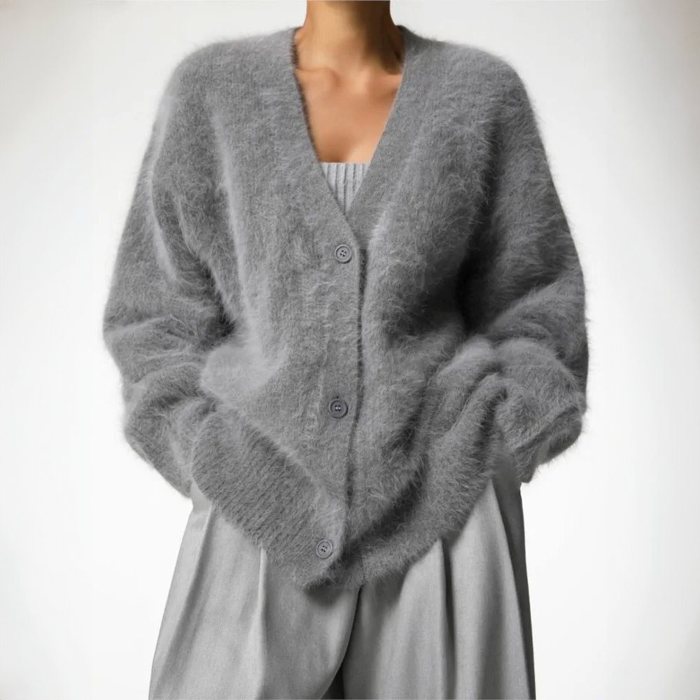 Mångsidig stickad damtröja med elegant fall, perfekt för höstmode och en bekväm stil.