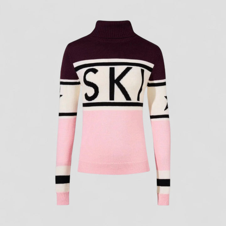Stretchig damtröja med hög turtleneck. Ger skön komfort och värme, en stilren del av vintergarderoben.