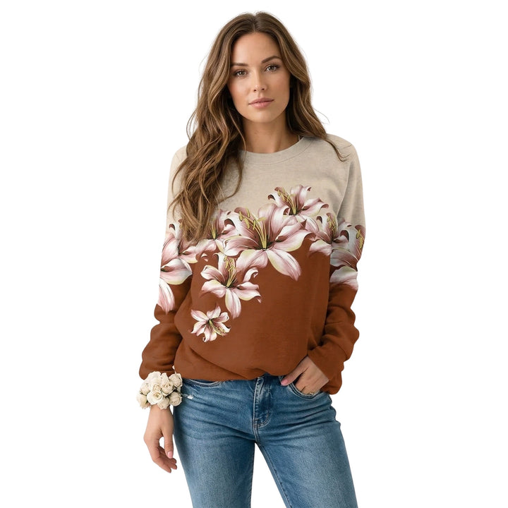 Elegant damtröja med lång ärm och vackert blommönster, perfekt för vardagsstil.